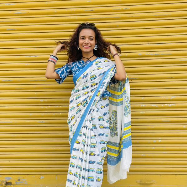 blue car print over saree , traditional block print at pallu